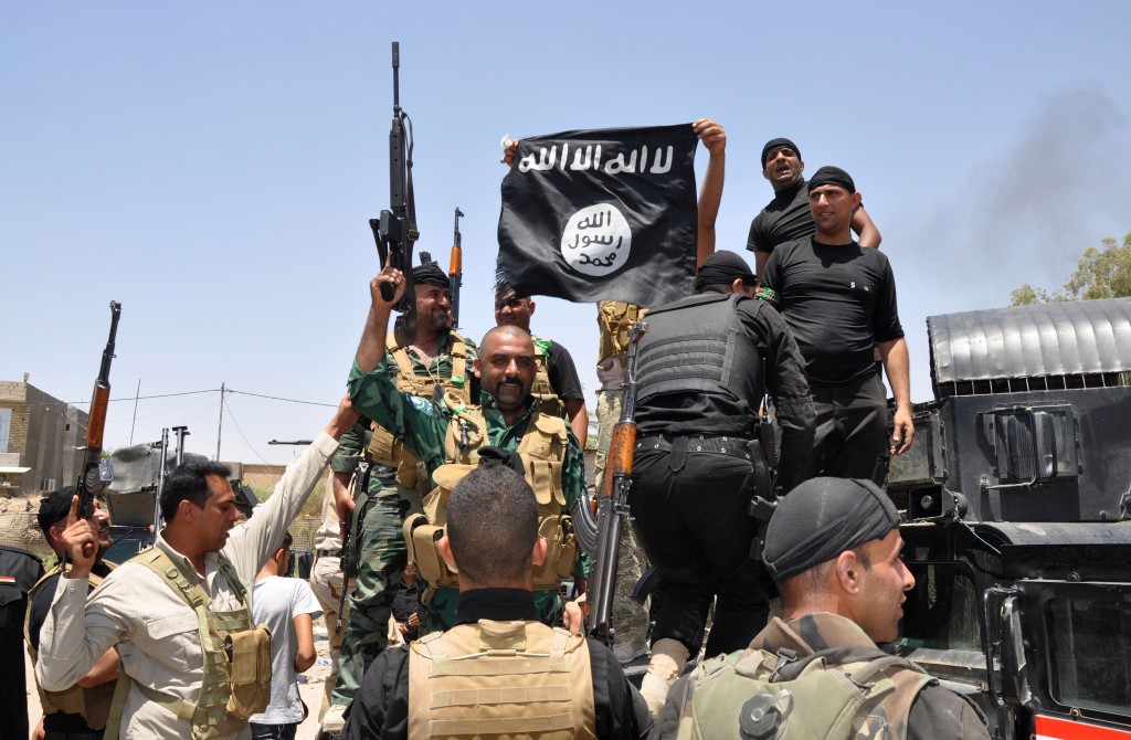 Miliziani dell'Isis in Iraq (AP Photo) - jihadisti al confine turco