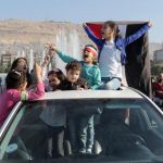Civili e militari al fianco di Assad in Siria